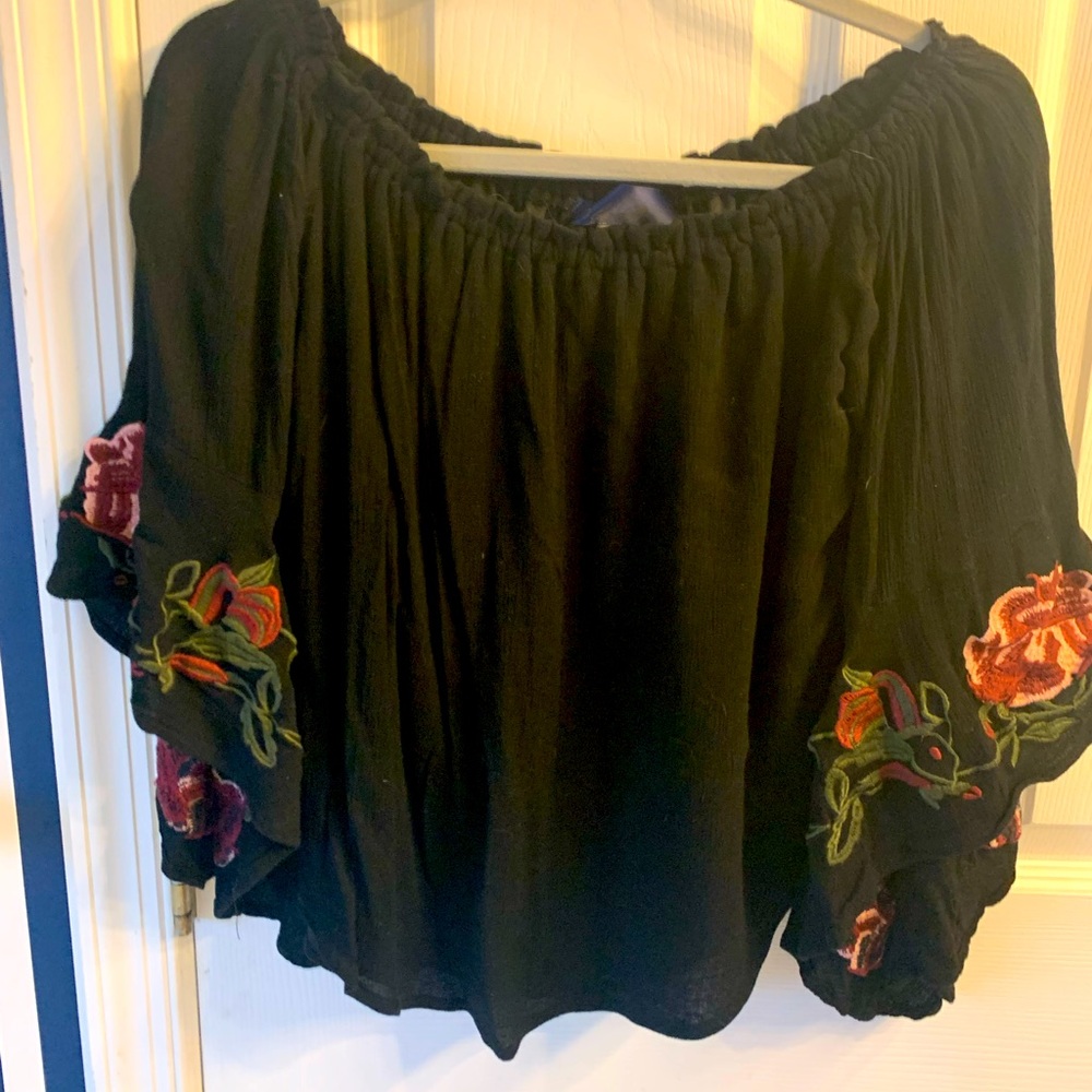 Off the shoulder, lined black with flower bell sleeves